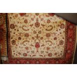 A contemporary cream ground Keshan rug, 230x160cm