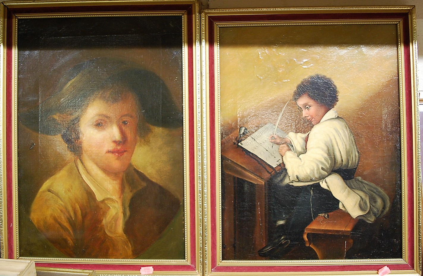 19th century oil on canvas of a boy writing, and a 19th century oil on canvas portrait bust of a