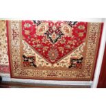 A contemporary red ground Heriz rug, 280x200cm
