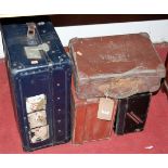 A vellum suitcase and three holdalls (4)
