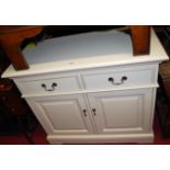 A contemporary white wood double door side cupboard, having twin frieze drawers, w.95cm