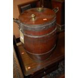 An early 20th century mahogany and iron bound ale barrel having twin carry handles, height 50cm,