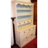 A contemporary cream painted pine kitchen dresser, width 127cm