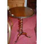 A Victorian walnut circular fixed top spiral twist pedestal occasional table, dia. 48cm