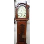 An early 19th century mahogany provincial long case clock, the arch white painted dial signed E