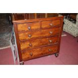 A mid-Victorian mahogany round cornered chest of two short over three long graduated drawers on