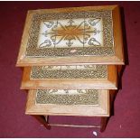 A contemporary antique and tile-top inset nest of three occasional tables, the largest width 55cm