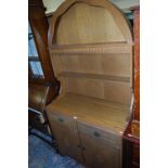 A contemporary oak effect dome top dresser, width 92cm