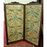 A good early 20th century mahogany framed three-fold dressing screen, each panel with fine floral