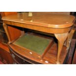 A 1930s figured walnut and walnut crossbanded round cornered low occasional table, length 93cm