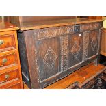 An 18th century and later line carved and joined oak three panelled hinge top coffer, width 107.5cm