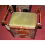 An Edwardian walnut music seat, having twin carry handles, w.59.5cm