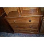 An Edwardian walnut chest of three long drawers, width 90.5cm