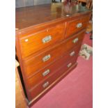 An Edwardian walnut square front chest of two short over three long drawers, having cast brass