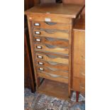 An early 20th century pine topped and oak narrow office filing chest by J Houden & Co Ltd,