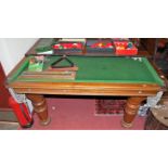 An early 20th century 8'x4' walnut slate bed snooker/diner by EJ Riley Ltd of Accrington, the