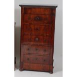 A 19th century French mahogany chest, having black marble top and a blind frieze drawer over five