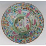 A large 19th century Chinese Canton famille verte bowl, the interior decorated in bright enamels