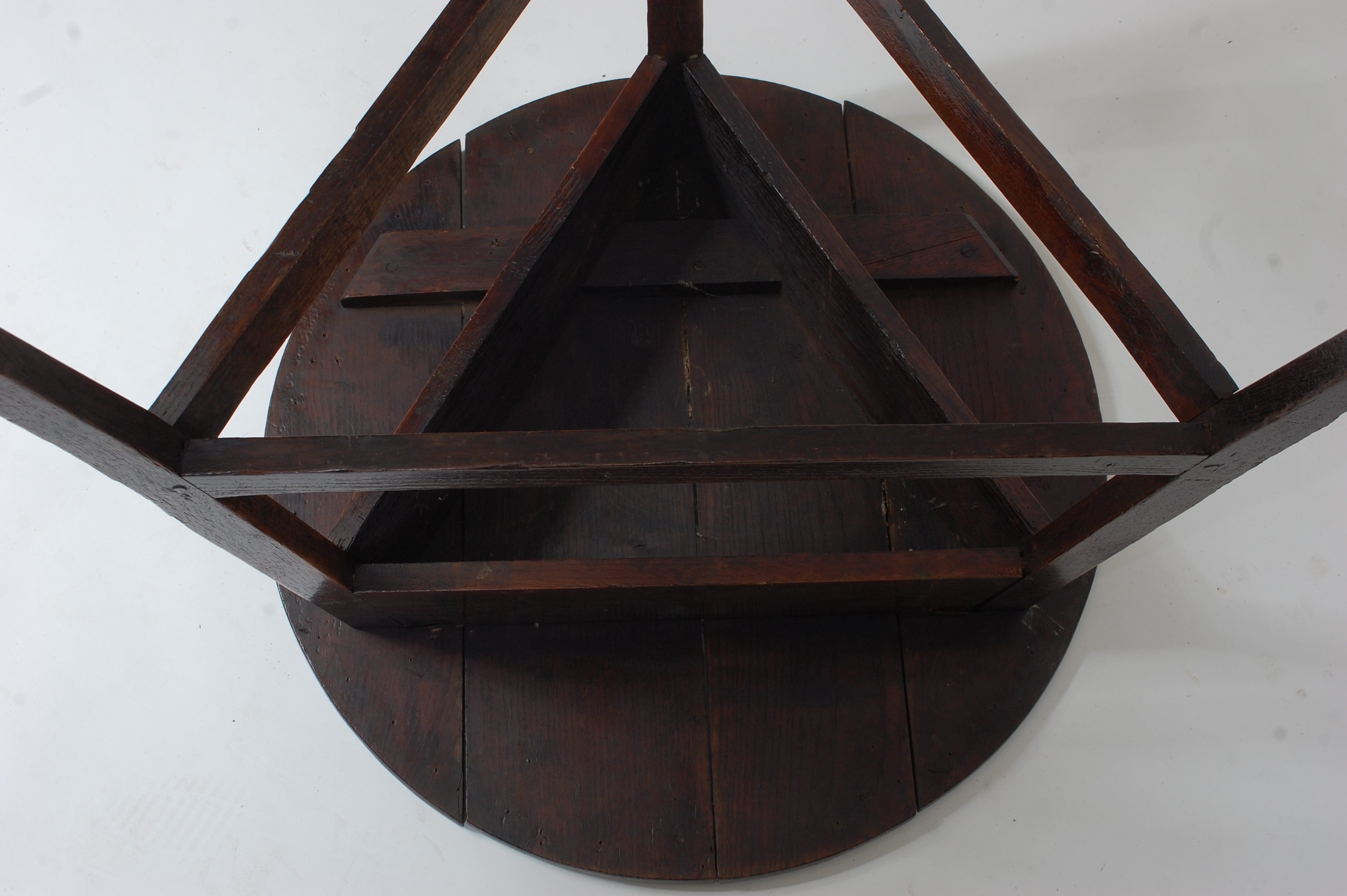 An 18th century oak cricket table, the circular four-plank top above a plain frieze, on typical base - Image 3 of 3