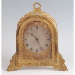 A mid-19th century gilt brass cased strut clock, in the manner of Thomas Cole, retailed by M.F.