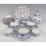*A Royal Copenhagen six place setting tea service, in the Blue Fluted Lace pattern, comprising
