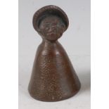 A Votes for Women Suffragette bronze bell, modelled as a Suffragette, h.12cm