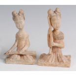 A pair of Chinese terracotta burial figures, each with simplistic painted decoration, h.17cm