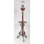 A Victorian gilt metal and enamel telescopic lamp standard, having a brass burner over thumb-cut