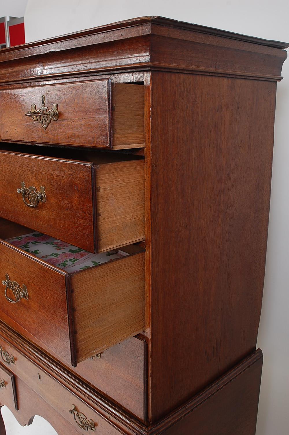 A George III oak chest-on-stand, having a cavetto cornice over two short and three long drawers, the - Image 3 of 3