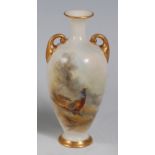 *A Royal Worcester porcelain twin handled vase, of baluster form, hand-painted with pheasant