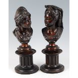 A pair of late 19th century French patinated bronze pedestal bust groups, of a young man and