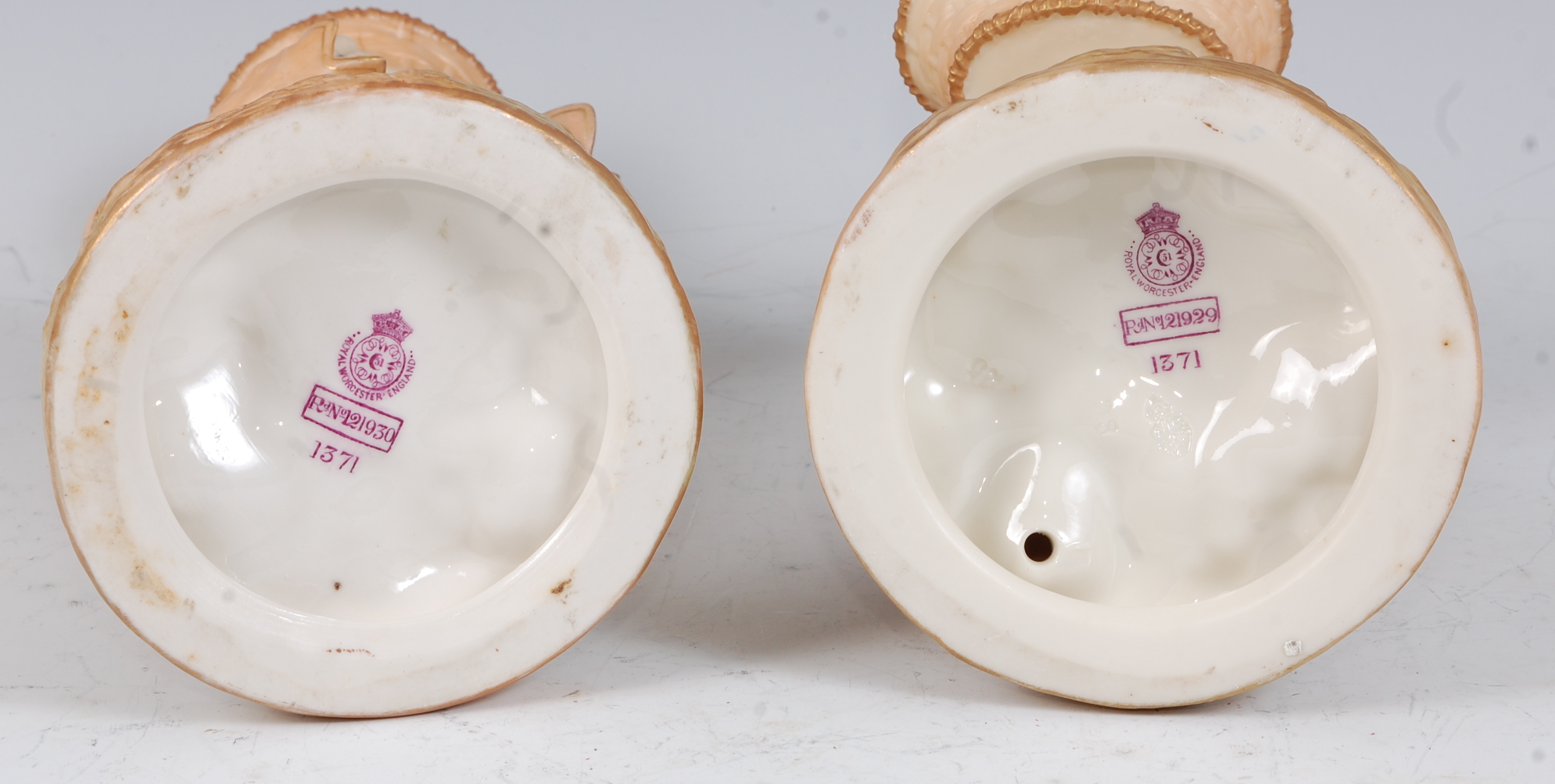 *A pair of Royal Worcester blush ivory figures, the boy in standing pose with a basket upon his - Image 2 of 2