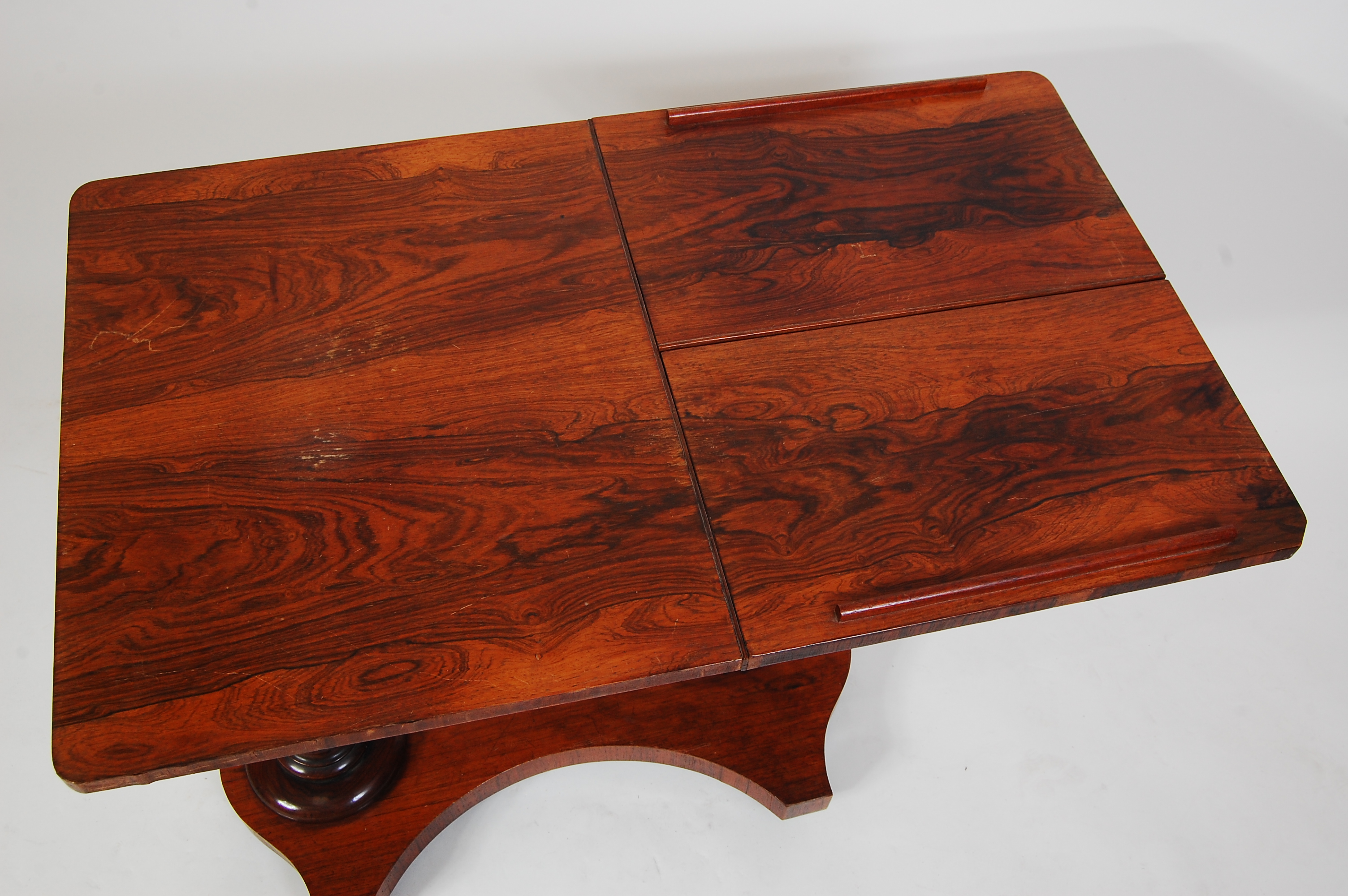 A Victorian rosewood bed table, having rise-and-fall action, hinged bookrest to platform base on - Image 2 of 5