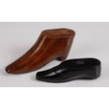 A 19th century carved treen shoe snuff, with sliding cover, 9cm; and one other small papier-mâché