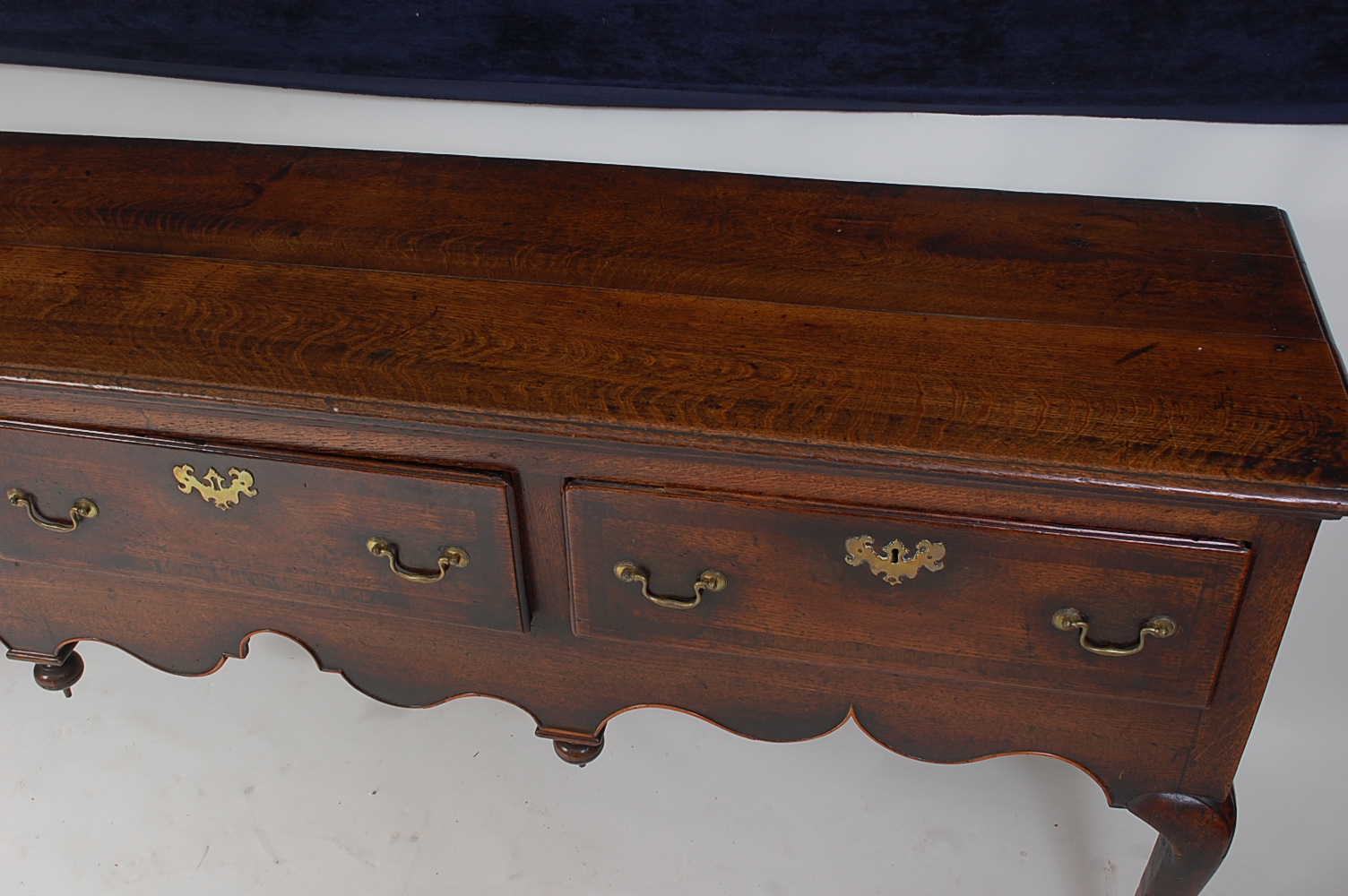 A George III North Country oak and mahogany crossbanded dresser base, the two-plank top having a - Image 3 of 8