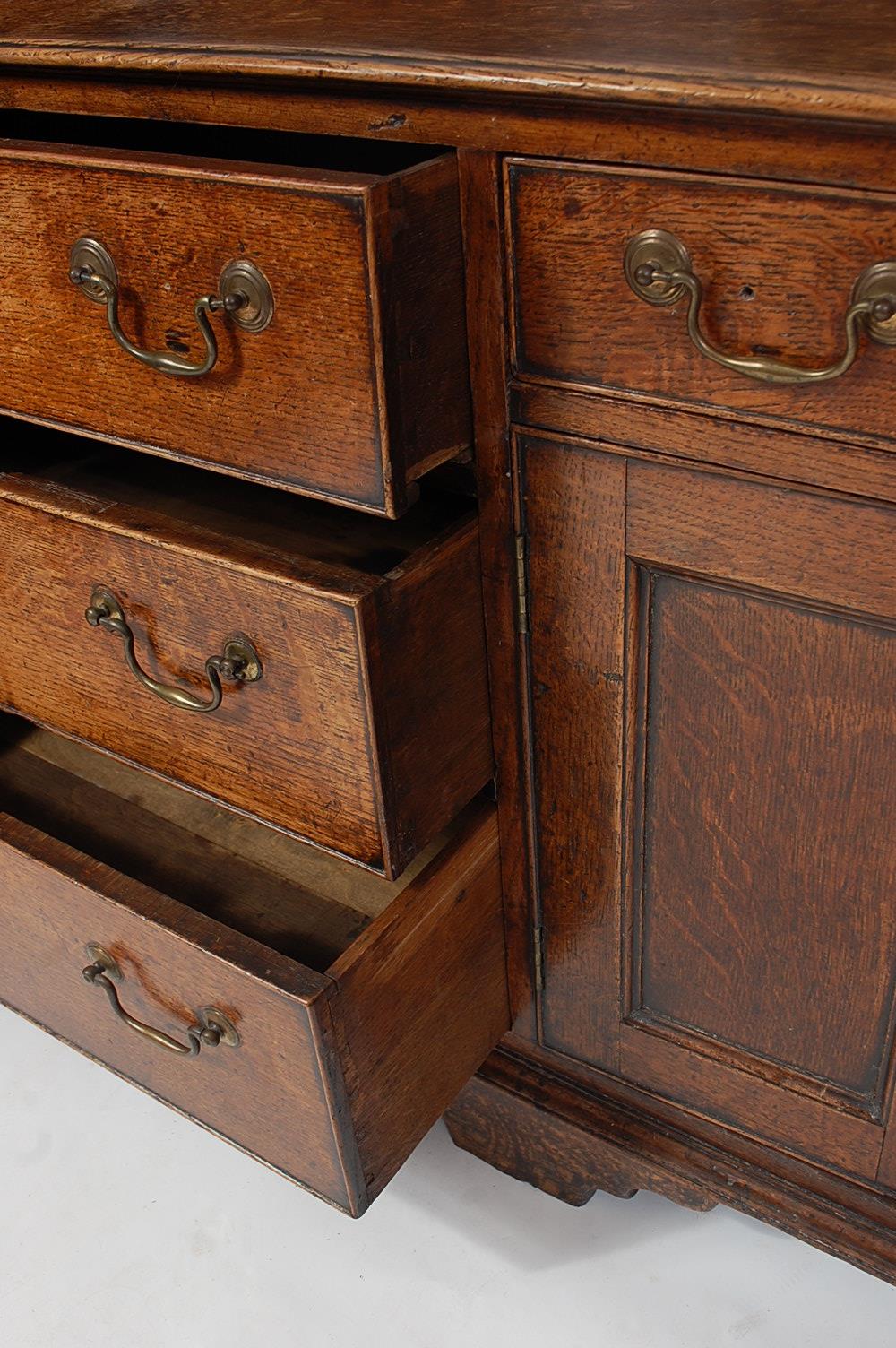 A George III oak Lancashire dresser, having a three-quarter gallery with pierced frieze, over an - Image 4 of 4