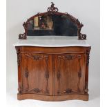 A Victorian rosewood serpentine front chiffonier, having associated mirrored back above a marble
