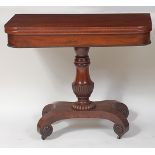 A William IV mahogany card table, the D-shaped fold-over top revealing a baize lined playing
