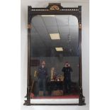 A Victorian Aesthetic Movement ebonised and parcel gilt wall mirror, of large proportions, having