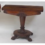 A William IV rosewood card table, the D-shaped fold-over top revealing a baize lined playing surface