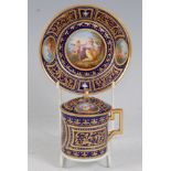 *A 19th century Vienna porcelain chocolate cup and cover on stand, hand-painted with classical