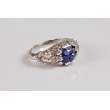 An early 20th century platinum, lavender sapphire and diamond ring, the hexagonal lavender