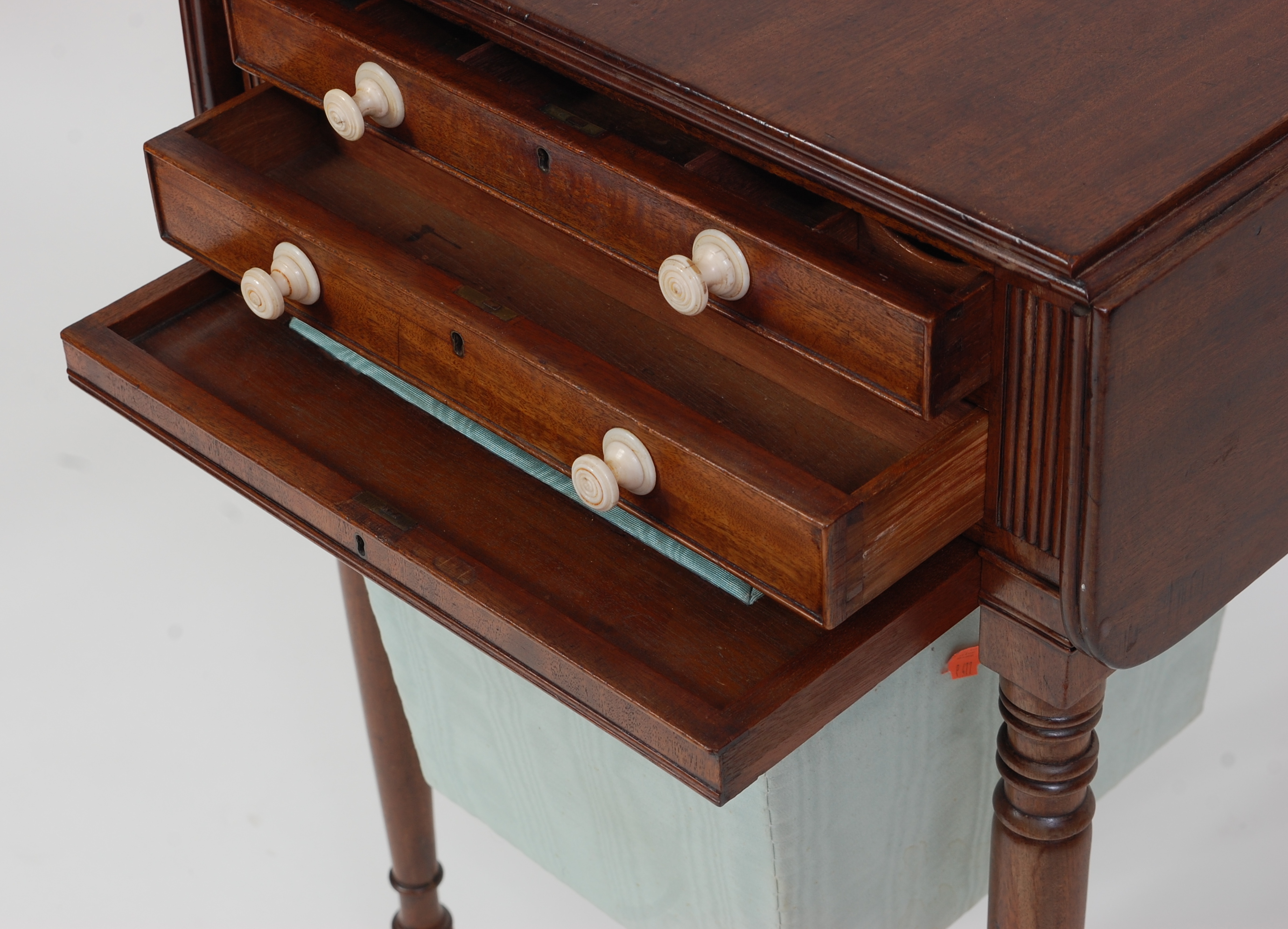 A Regency mahogany work table, the hinged rectangular top above two short drawers with turned - Image 2 of 2