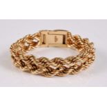 A 9ct rope twist bracelet, the the two double rope twist strands with bead detail, dual finish box