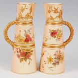 *A near-pair of Royal Worcester porcelain blush ivory ewers, each of conical form, hand-painted with