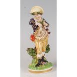 An early 19th century Bloor Derby figure of a boy, from the French Seasons series after the