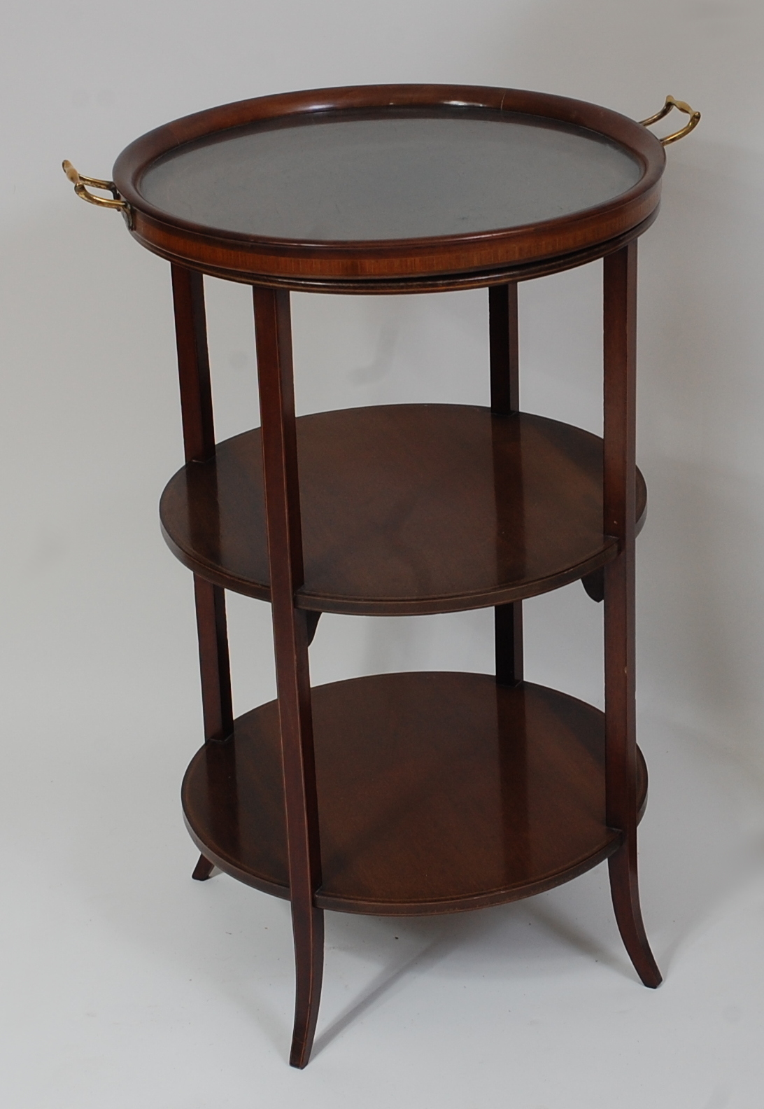 *An Edwardian mahogany, satinwood crossbanded, and boxwood strung tray-top three tier occasional