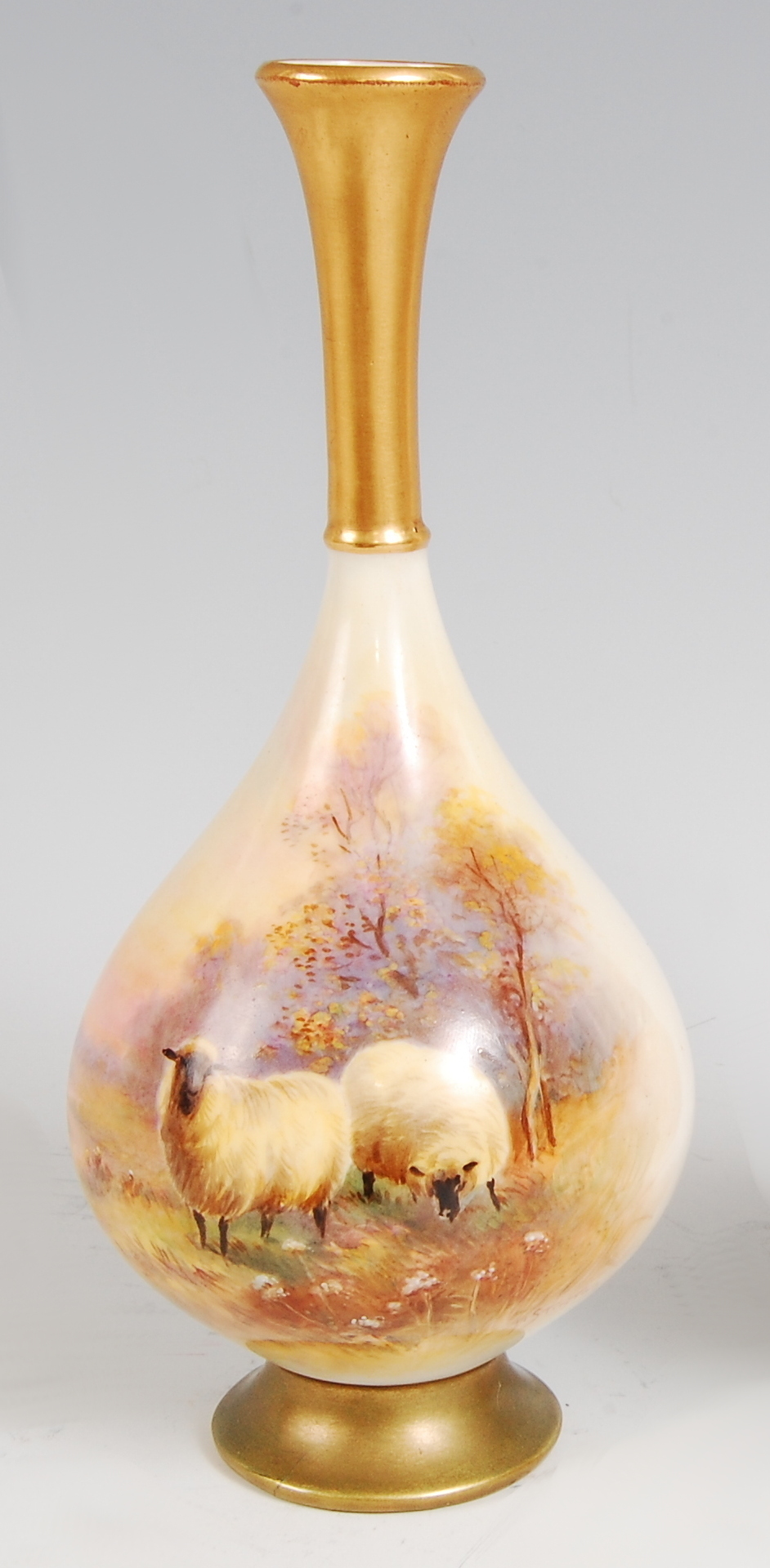 *A Royal Worcester porcelain vase, having trumpet shaped rim to slender neck and bulbous lower body,