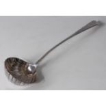 A George III silver soup ladle, in the Feather-edge pattern, having a shell shaped bowl, 5.2oz,maker