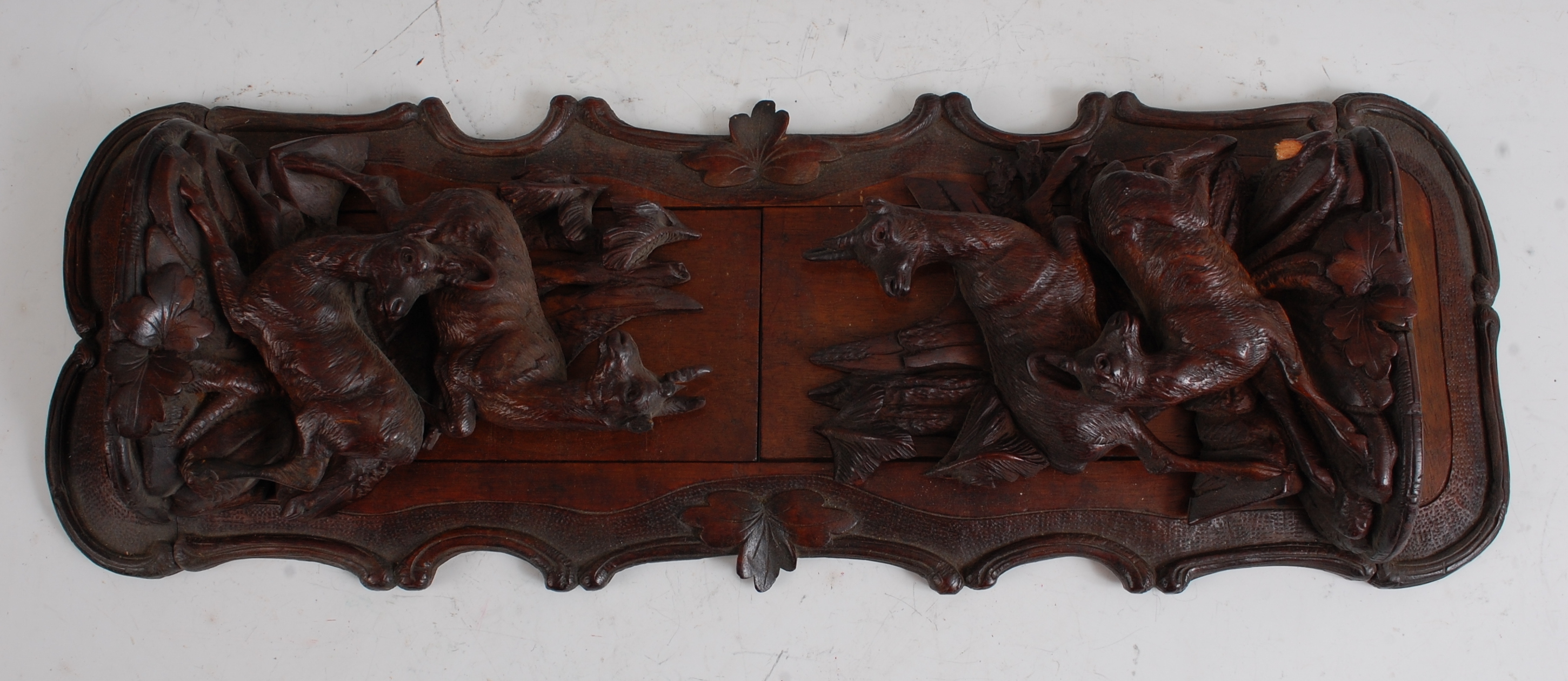 A circa 1900 Black Forest bookslide, the folding ends each carved as a pair of fauns in a - Image 3 of 3